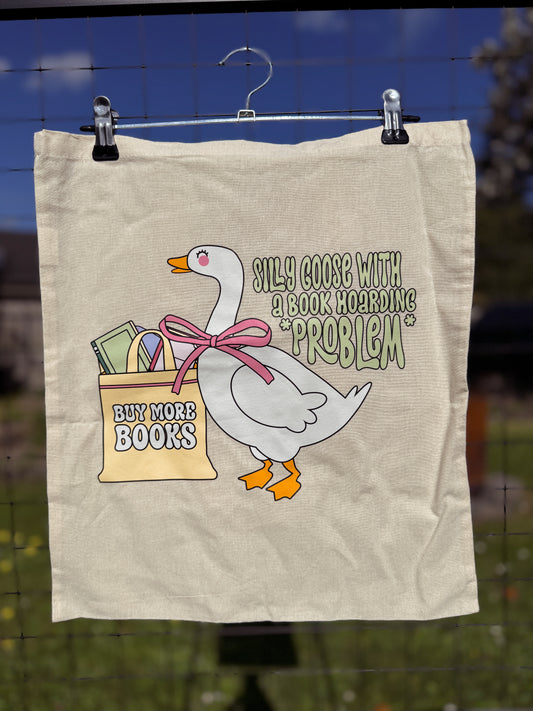 Silly goose with a book hoarding problem